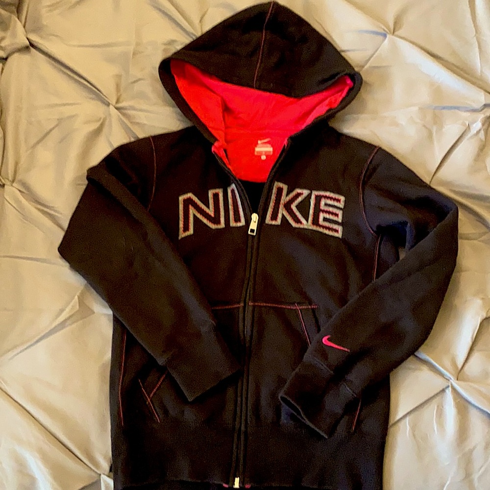 Girls size Medium Nike zip up sweat jacket. Black and hot pink.